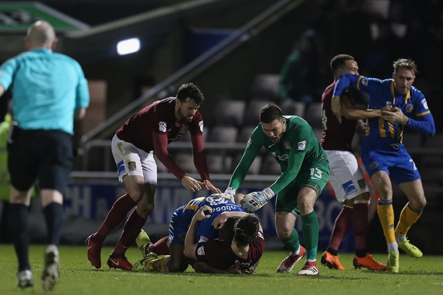 Brendan Moloney and Richard O'Donnell attempt to part John-Joe O'Toole of Northampton Town and Abu Ogogo of Shrewsbury Town as they clash, for which O'Toole and Ogogo were shown a red card, during the Sky Bet League One match between Northampton Town and Shrewsbury Town at Sixfields on March 20, 2018.