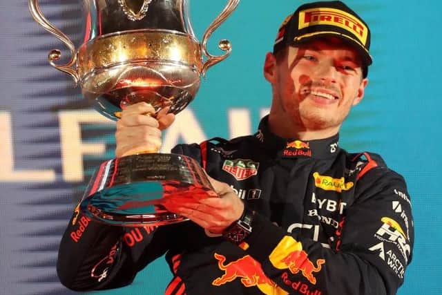 BAHRAIN, BAHRAIN - MARCH 05: Race winner Max Verstappen of the Netherlands and Oracle Red Bull Racing celebrates on the podium during the F1 Grand Prix of Bahrain at Bahrain International Circuit on March 05, 2023 in Bahrain, Bahrain. (Photo by Peter Fox/Getty Images)