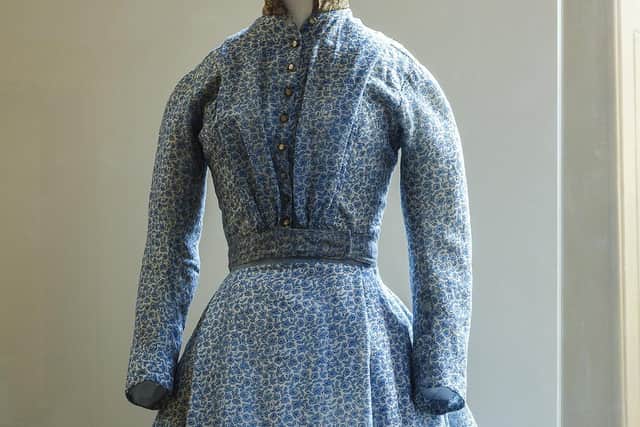 The blue and white dress ‘Thackeray Dress’, made c 1848 by Charlotte Brontë and the family’s housekeeper Martha Brown, and worn by Charlotte on a visit to London in June 1850 when she met her literary hero, William Makepeace Thackeray. The dress was altered later by Martha’s niece, who added a brown collar and removed the fullness of the original skirt. Photo: Gareth Gardner