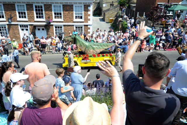 The Parade makes its way down the High Street. Picture taken by Yorkshire Post Photographer Simon Hulme 10th June 2023