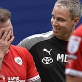 Barnsley head coach Michael Duff, pictured with James Norwood after the game with Sheffield Wednesday earlier this season. Picture: Steve Ellis