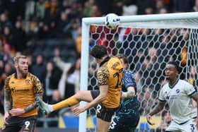 DENIED: Kyle Joseph (centre) finds the back of the net but his goal was disallowed (Image: Richard Sellers/PA Wire)
