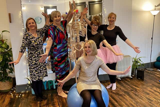 Party Dress Day at a pilates class, with Alex (centre).