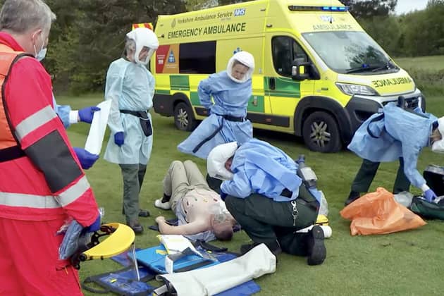 Paramedics attend to John Anderson after he suffers a massive heart attack at Hillsborough Golf Club in Sheffield. He was airlifted to hospital by Yorkshire Air Ambulance, and his story features on the TV show Helicopter ER
