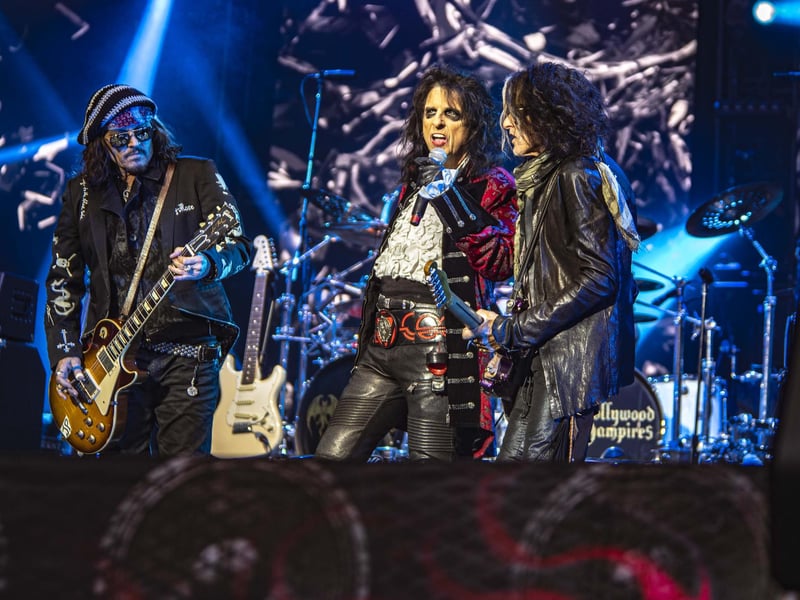 Hollywood star Johnny Depp, left, with rock legends Alice Cooper and Joe Perry.