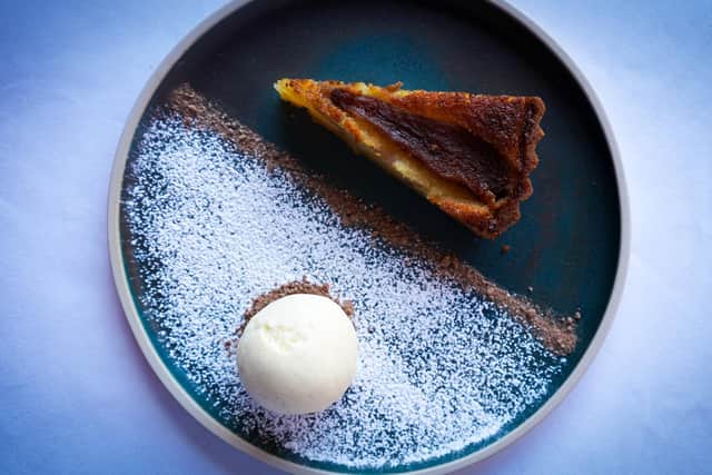 Mulled pear tart with eggnog ice cream