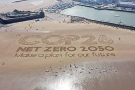 A giant sand artwork on New Brighton Beach highlighting climate change before the Cop26 global climate conference in 2021. PIC: Christopher Furlong/Getty Images
