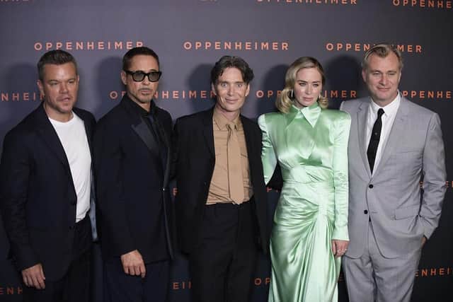 Actors Matt Damon, Robert Downey Jr., Cillian Murphy, Emily Blunt and film director Christopher Nolan pose upon their arrival for the Premiere of the movie Oppenheimer. (Pic credit: Julien De Rosa / AFP via Getty Images)