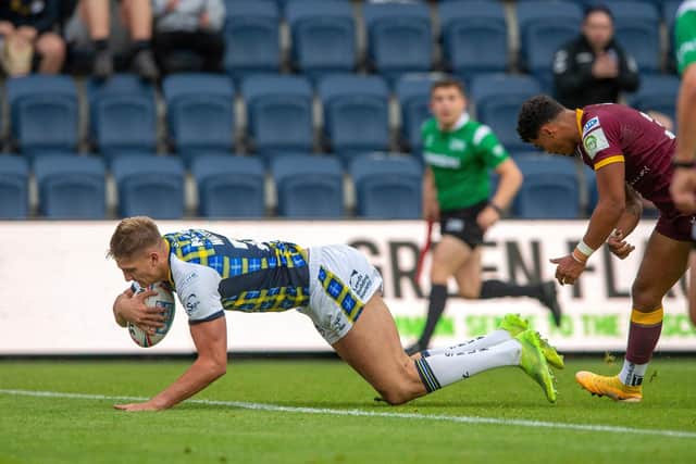 Sam Walters score the Rhinos' first try. (Photo: Bruce Rollinson)
