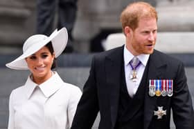 Britain's Prince Harry and his wife Meghan, the Duke and Duchess of Sussex, leave at the end of the National Service of Thanksgiving for The Queen's reign at Saint Paul's Cathedral in London on June 3, 2022 as part of Queen Elizabeth II's platinum jubilee celebrations. - Queen Elizabeth II kicked off the first of four days of celebrations marking her record-breaking 70 years on the throne, to cheering crowds of tens of thousands of people. But the 96-year-old sovereign's appearance at the Platinum Jubilee -- a milestone never previously reached by a British monarch -- took its toll, forcing her to pull out of a planned church service. (Photo by TOBY MELVILLE / POOL / AFP) (Photo by TOBY MELVILLE/POOL/AFP via Getty Images)