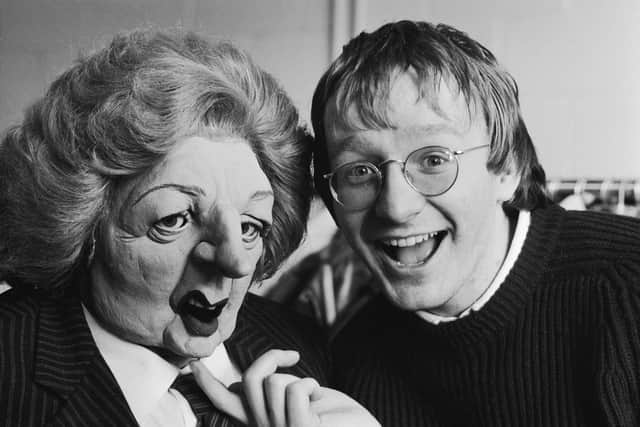 Impressionist Steve Nallon poses with a puppet of Margaret Thatcher from the satirical TV show Spitting Image in 1985. Photo by Dunn/Express/Hulton Archive/Getty Images.