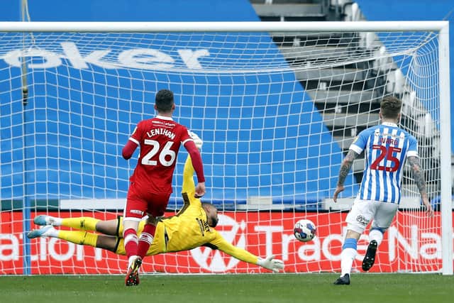 Huddersfield Town's Josh Koroma (not pictured) scores their side's second goal of the game past Middlesbrough goalkeeper Zack Steffen during the Sky Bet Championship match at John Smith's Stadium, Huddersfield. Picture date: Saturday April 1, 2023. PA Photo. See PA story SOCCER Huddersfield. Photo credit should read: Will Matthews/PA Wire.

RESTRICTIONS: EDITORIAL USE ONLY No use with unauthorised audio, video, data, fixture lists, club/league logos or "live" services. Online in-match use limited to 120 images, no video emulation. No use in betting, games or single club/league/player publications.
