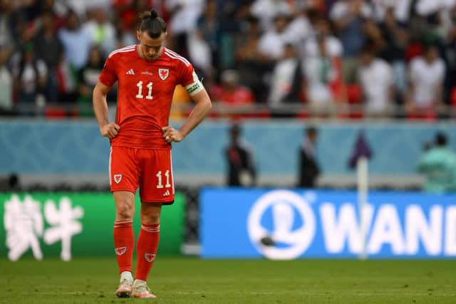 Wales' forward Gareth Bale reacts at the end of the Qatar 2022 World Cup Group B football match between Wales and Iran (Picture: NICOLAS TUCAT/AFP via Getty Images)