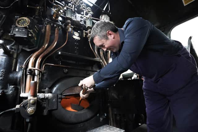 Volunteer train crew member Ian, aboard The Flying Scotsman at the launch of its centenary campaign. Picture: James Manning/PA