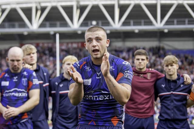 Hull KR's Mikey Lewis leads a huddle after their loss to Wigan. (Photo: Allan McKenzie/SWpix.com)