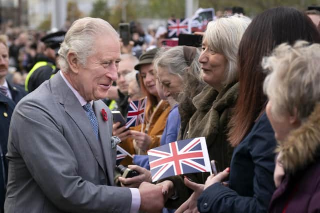 King Charles III greeting members of the public whilst arriving at a reception with young leaders from across Bradford, at Bradford City Hall, West Yorkshire. Picture date: Tuesday November 8, 2022.