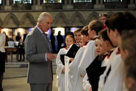 King Charles pictured on his visit to York Minster. The King meets the choir.
