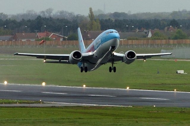 The plane taking off on the runway at DSA.