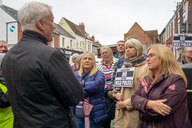 Conservative Beverley and Holderness MP Graham Stuart in Hedon Market Place for a street surgery being confronted by anti-broadband pole protesters with the Going Underground campaign group, on Saturday, October 21. Picture is from Ray Duffill