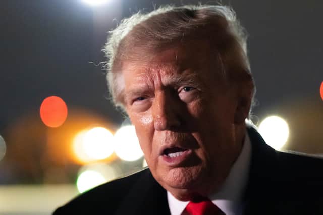 President Donald Trump speaks with reporters. PIC: AP Photo/Alex Brandon