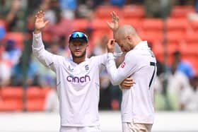 Ben Duckett, left, with hands held high following an unsuccessful appeal by Jack Leach, right, claimed that England were in a strong position after day one - a nonsense statement embarrassingly exposed. Photo by Stu Forster/Getty Images.