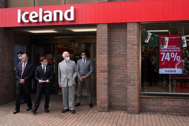 Managing director of Iceland Richard Walker (second left), and Sir Malcolm Walker (left) gave then-Prince Charles, Prince of Wales a tour of the headquarters. (Pic credit: Christopher Furlong / Getty Images)