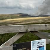 Crews remain at Marsden Moor fire as weather “continues to get warmer”