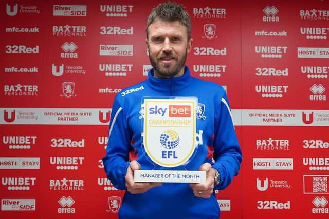 Michael Carrick with his monthly award for March. Picture courtesy of EFL.