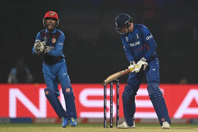 Brave effort: Yorkshire and England's Harry Brook is bowled by Mujeeb ur Rahman for his side's top score of 66 during their thrashing at the hands of Afghanistan at the World Cup in India. (Photo by Gareth Copley/Getty Images)