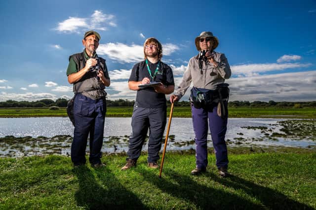 Pictured Volunteers Ray Priestley, and Catherine Palmer with (centre) Anthony Cox, from The The Don Catchment River Trust, surveying the wildlife on this wetland. Picture: James Hardisty.