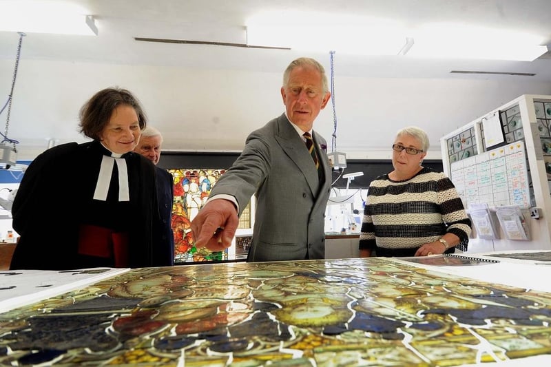 Prince Charles chats to the Dean of York Very Rev Vivien Faull and Sarah Brown Director of the York Glaziers Trust in July 2013.