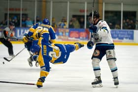 WE MEET AGAIN: Leeds Knights' Dylan Hehir clashes with Sheffield Steeldogs' Oliver Turner during Friday's NIHL National showdown at Elland Road. Picture courtesy of Oliver Portamento
