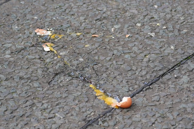 A broken egg on the street after it was thrown at King Charles III and the Queen Consort as they arrived for a ceremony at Micklegate Bar in York, where the Sovereign is traditionally welcomed to the city. Picture date: Wednesday November 9, 2022.