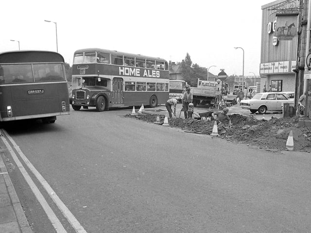 Some lovely seventies buses pictured here, as work continues outside the old Horse & Jockey