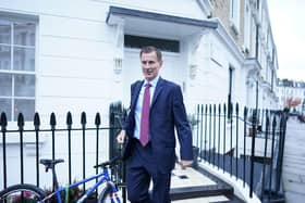 Chancellor of the Exchequer Jeremy Hunt leaves his home in London as he prepares to delivery his autumn statement on Thursday.