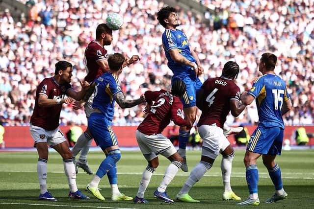 HEADS UP: Tomas Soucek wins the ball in the air despite Pascal Struijk's best efforts (Image: Henry Nicholls / AFP via Getty Images)