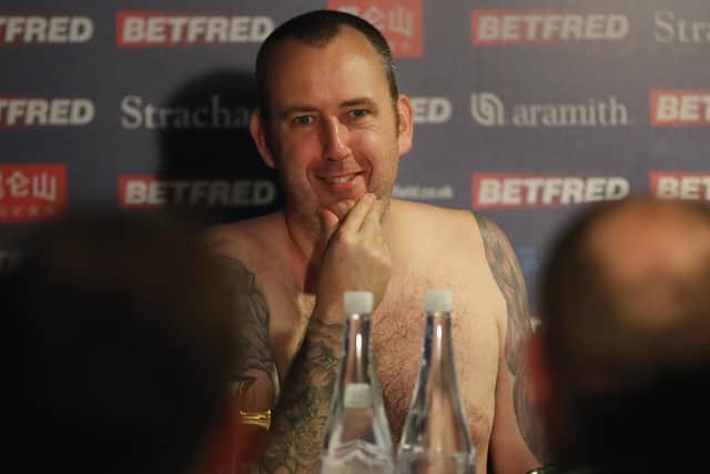 True to his word: Mark Williams of Wales speaks to the media naked during a press conference after winning the 2018 world championship (Picture: Linnea Rheborg/Getty Images)