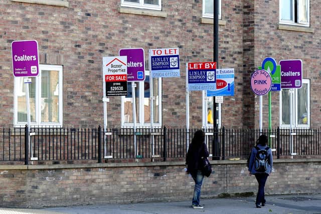 File photo dated 02/10/08 of for sale and to let boards on a street in York, as the historic Yorkshire city has recorded the strongest house price inflation across England and Wales's towns and cities in 2022, according to analysis.