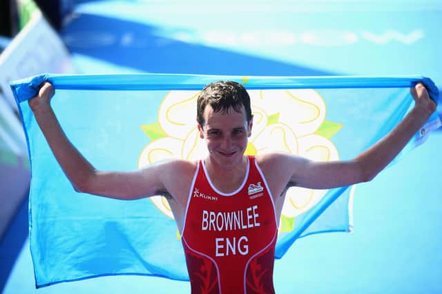 Golden moment: Alistair Brownlee of England crosses the line to win gold in the Men's Triathlon at Strathclyde Country Park during day one of the Glasgow 2014 Commonwealth Games on July 24, 2014 in Glasgow, Scotland, part of the reason why he knows he Commonwealth Games is special (Picture: Julian Finney/Getty Images)
