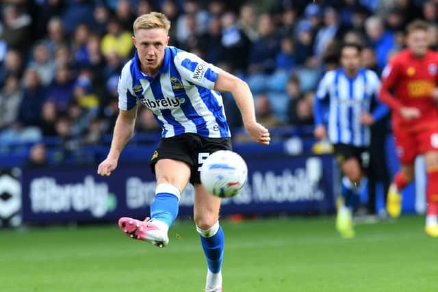 OFF THE MARK: Davis Keillor -Dunn scores his second goal (Image: Steve Ellis)