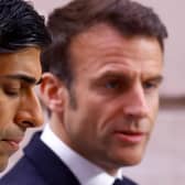 British Prime Minister Rishi Sunak (L) and French President Emmanuel Macron hold a joint news conference as part of the Franco-British Summit held at Elysee Palace in Paris, on March 10, 2023. (Photo by GONZALO FUENTES / POOL / AFP) (Photo by GONZALO FUENTES/POOL/AFP via Getty Images)