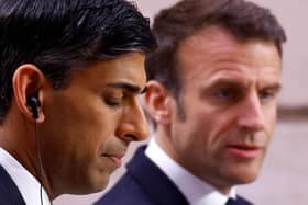 British Prime Minister Rishi Sunak (L) and French President Emmanuel Macron hold a joint news conference as part of the Franco-British Summit held at Elysee Palace in Paris, on March 10, 2023. (Photo by GONZALO FUENTES / POOL / AFP) (Photo by GONZALO FUENTES/POOL/AFP via Getty Images)