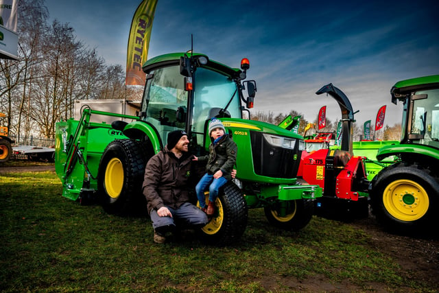 Nick Sidgwick, of Ripon, with his son Duggy, aged 4, looking around the show.
