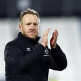 Huddersfield Town caretaker manager Jon Worthington applauds the fans after the Sky Bet Championship win over Sunderland. Picture: Richard Sellers/PA Wire.