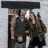 Clive and Amanda Owen, and one of their nine children Sidney, who is now 10. (Pic credit: James Hardisty)