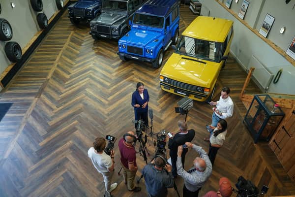 Conservative leader Kemi Badenoch speaks with the media as she visits Twisted Automotive, a custom automotive showroom and cafe
