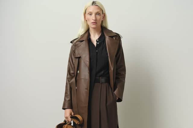 Top to toe tonal dressing: Featuring luxury fabrics such as leather. This is a John Lewis & Partners brown leather trench coat, £399, coming soon for AW23.
