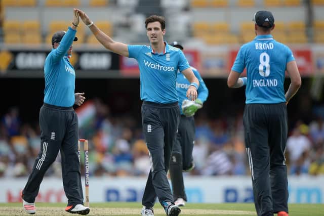 Steven Finn celebrates a wicket for England in the tri-series in Australia in 2015. Photo by Gareth Copley/Getty Images