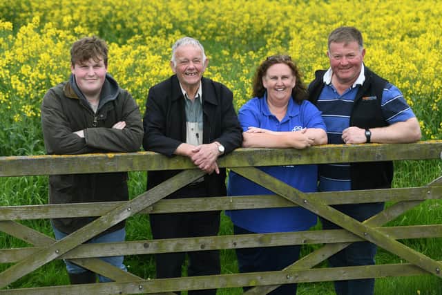 Sharon Shepherdson at East Leys Farm, Grindale, near Bridlington. Sharon pictured with son Tom, father John and husband Robin.