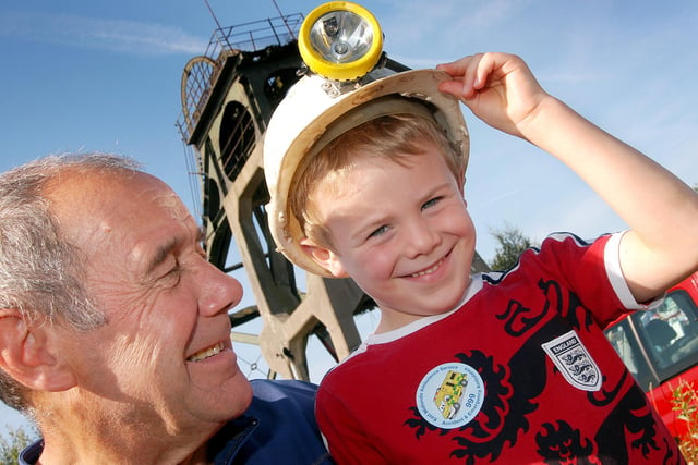 Five-year-old Stanley Clarke got a lesson in mining from grandad Harold Billings of Skegby, when they visited the Pleasley Colliery annual open day in 2009